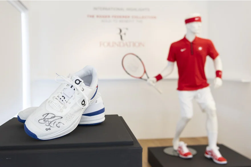 Federer to auction clothes, rackets and other gear for charity