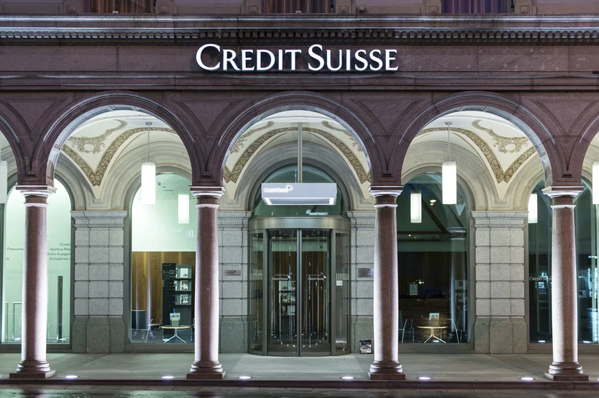 Credit Suisse reaches deal with former employee in spying case