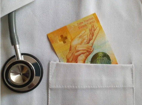 Swiss health premiums to rise for many in 2022 despite average price fall
